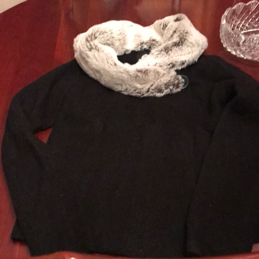 Black with fake fur collar.  Barely worn